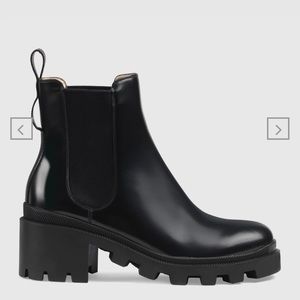 Gucci Leather ankle boot with belt